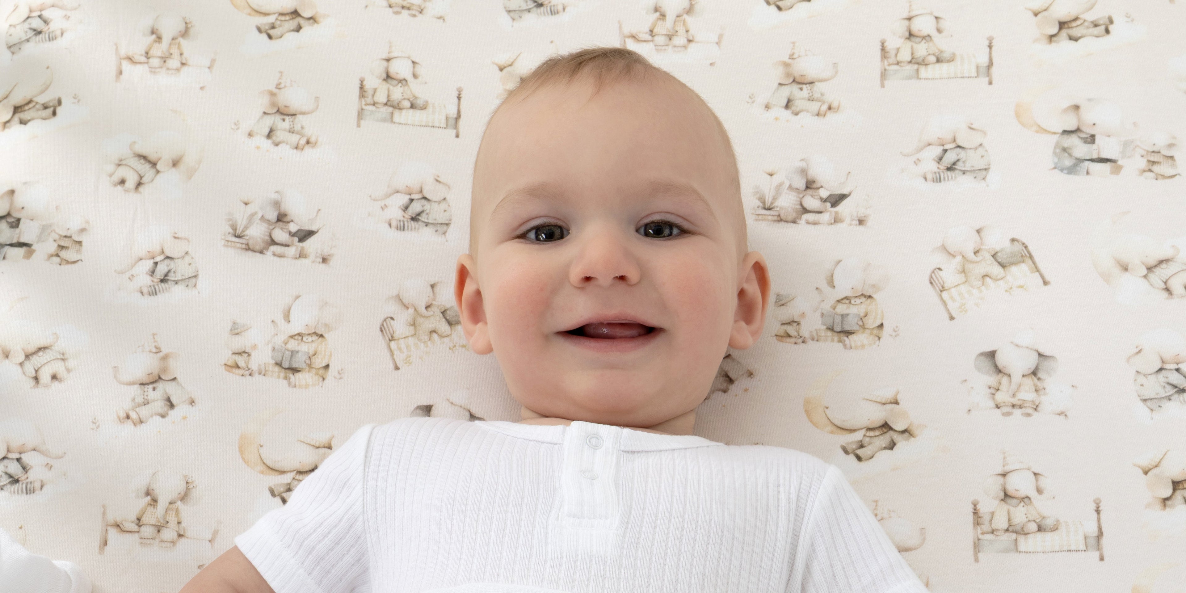baby nursery with cot fitted sheet